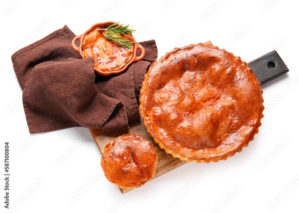 Board and delicious meat pies isolated on white background