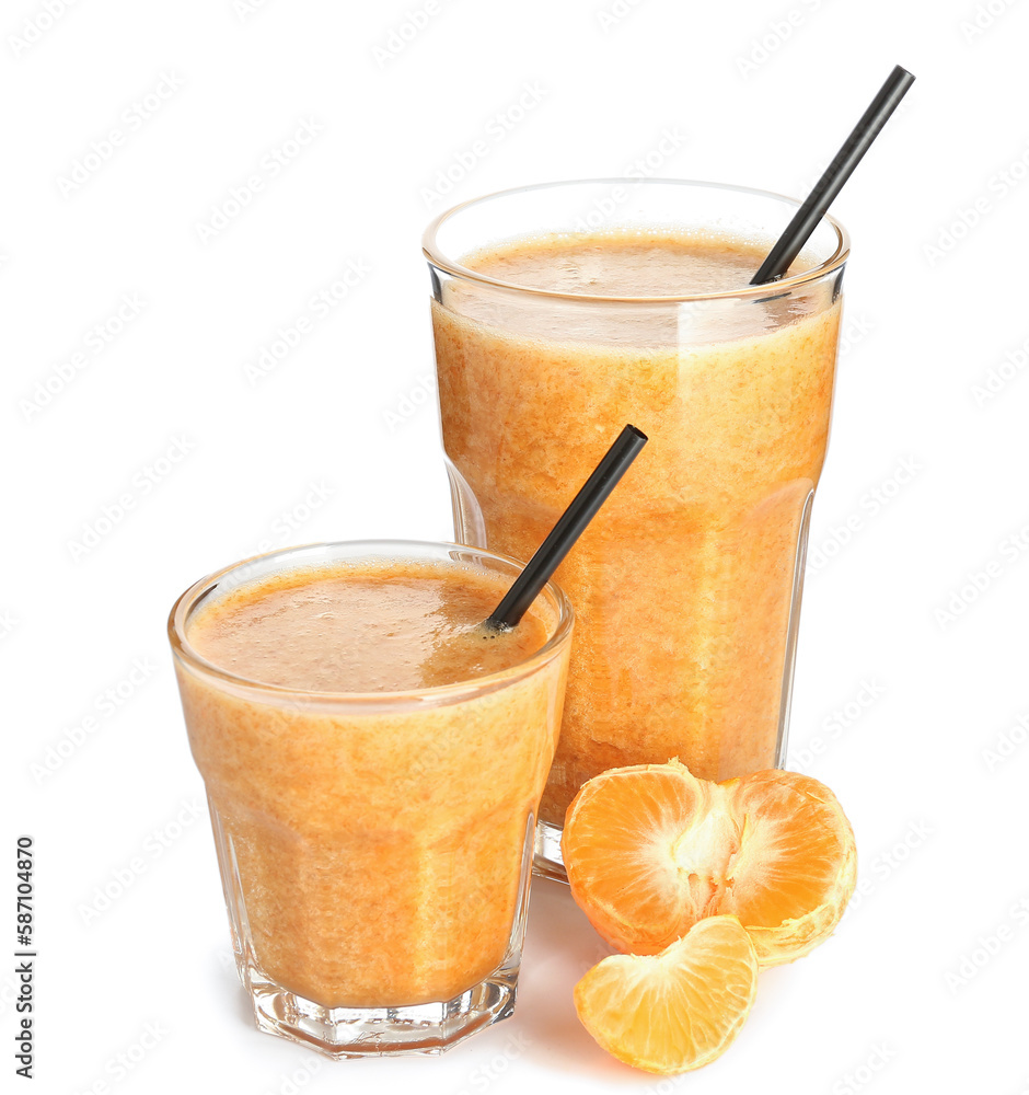 Glasses of healthy tangerine smoothie isolated on white background