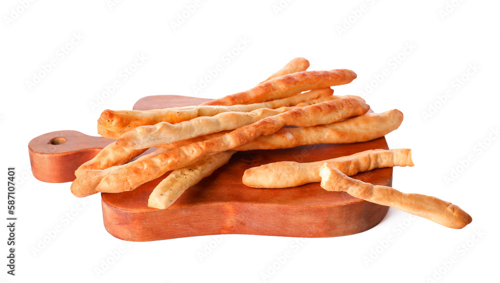 Wooden board with tasty Italian Grissini isolated on white background