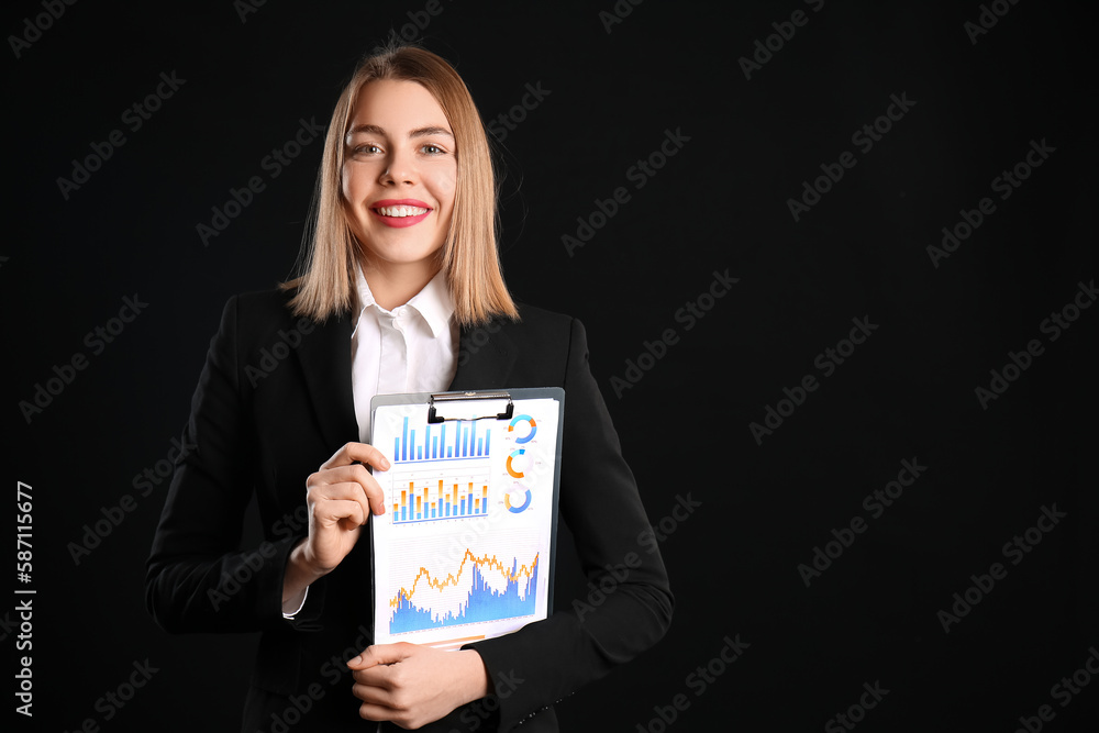 Female business consultant with clipboard on black background