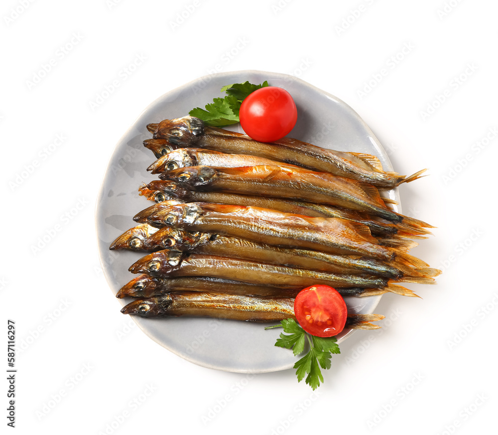 Plate with delicious smoked capelin, tomatoes and parsley isolated on white background