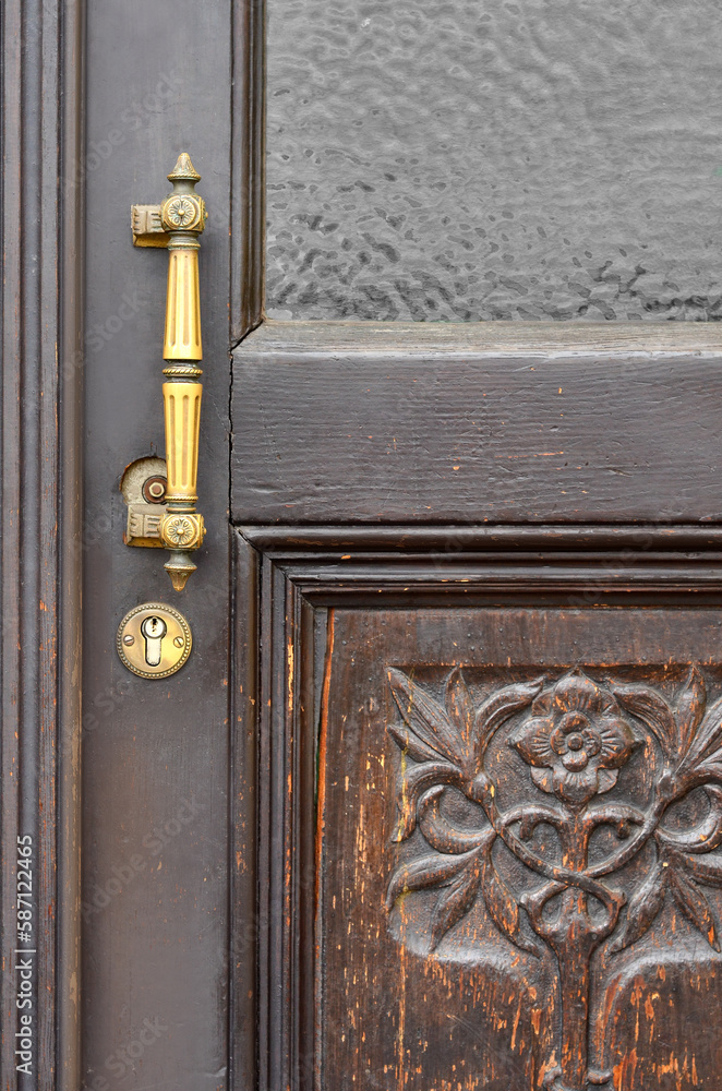 View of old wooden door in city, closeup