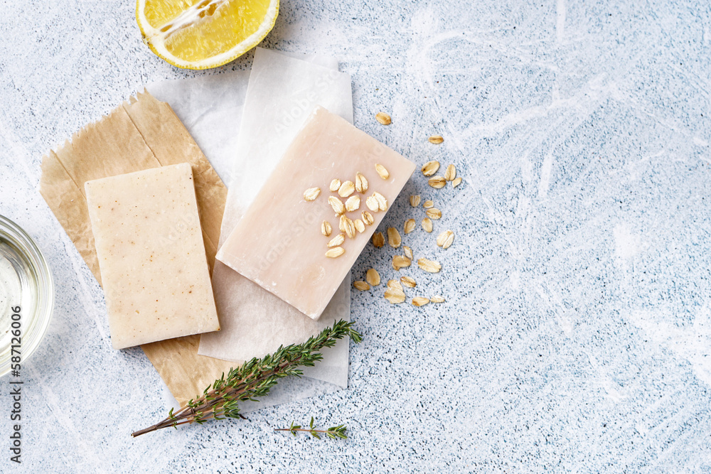 Composition with soap and natural ingredients on light background