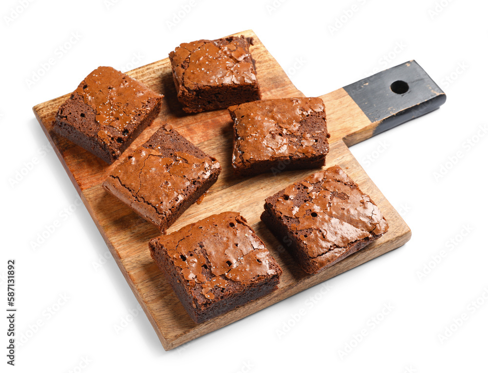 Wooden board with pieces of tasty chocolate brownie isolated on white background