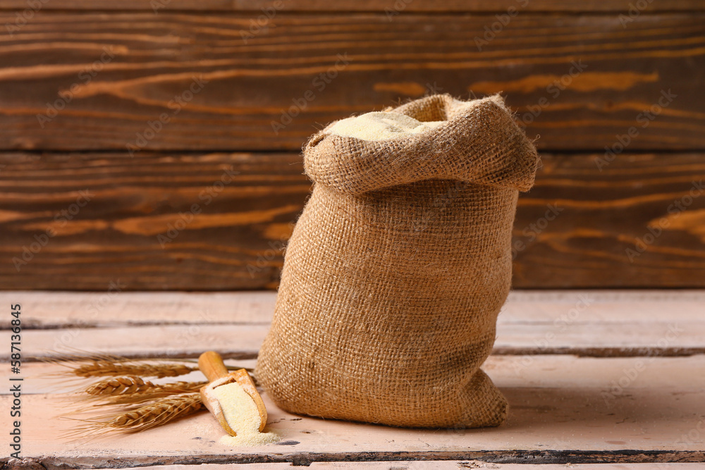 Sack bag with raw semolina on table