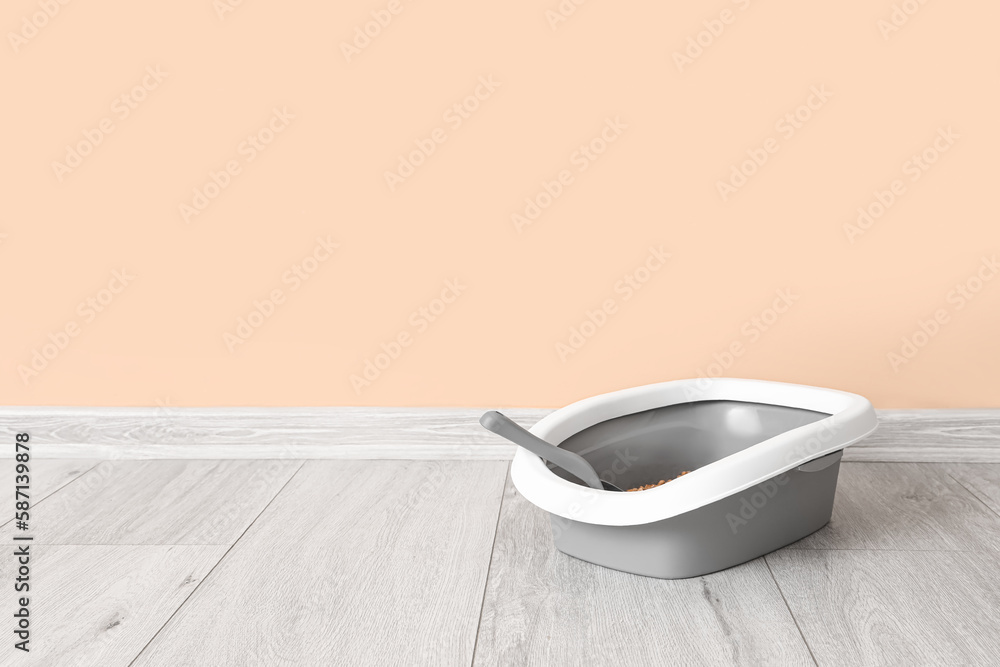 Litter box for cat on floor