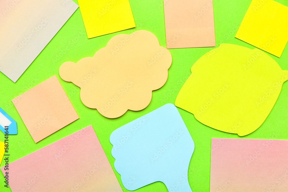 Composition with sticky notes on green background