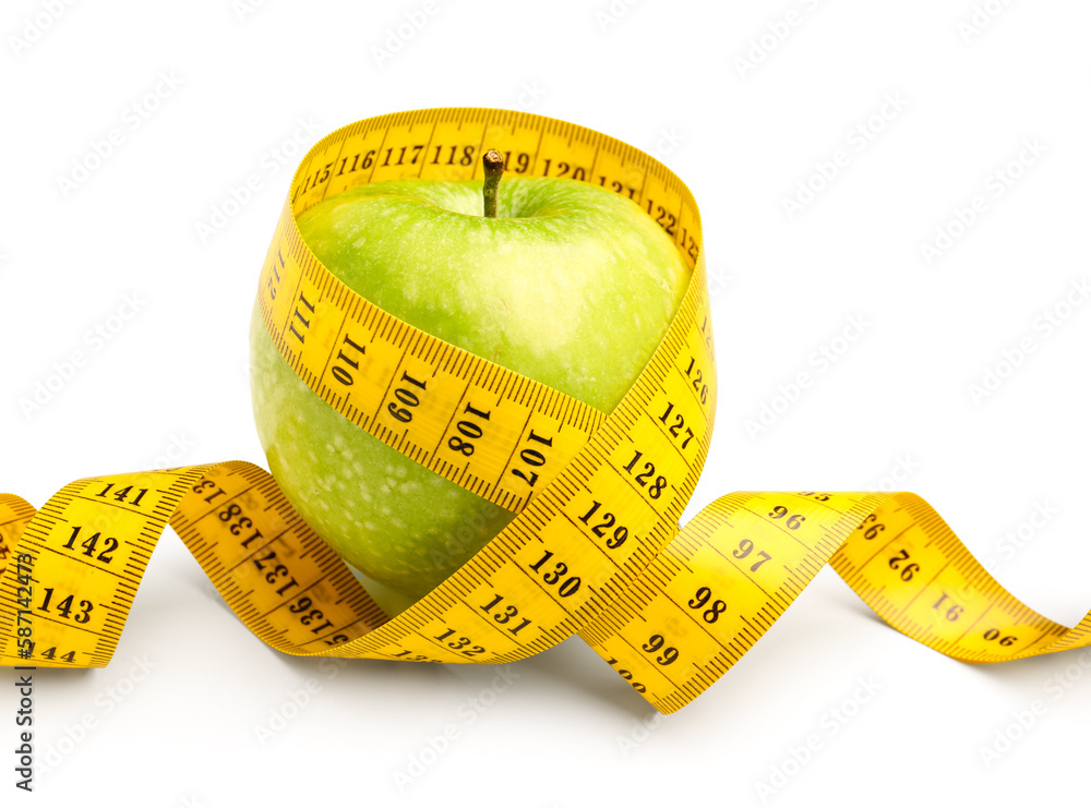 Apple and yellow measuring tape on white background. Diet concept