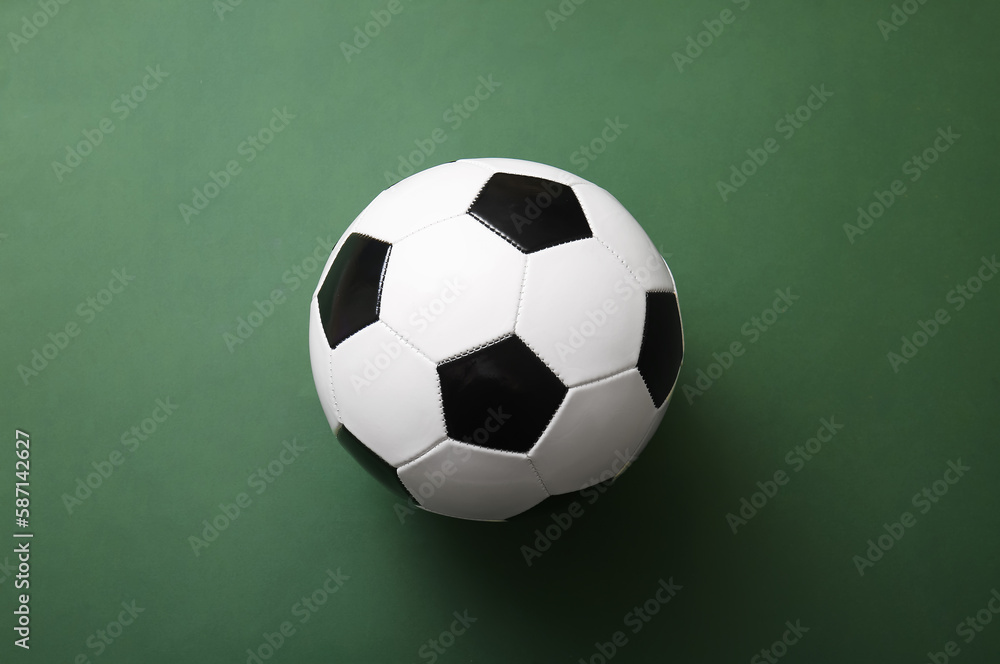 Soccer ball on green background