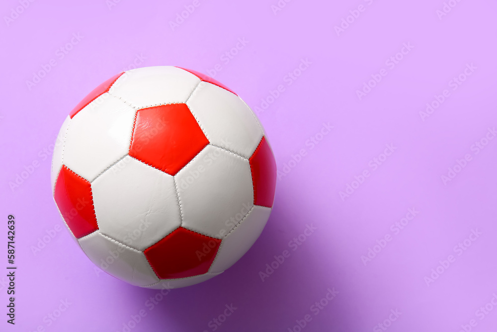 Soccer ball on lilac background