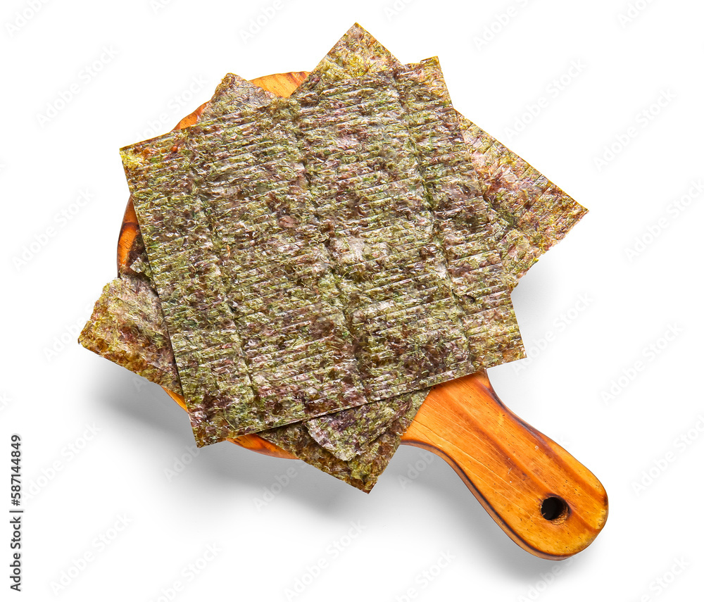 Wooden board with natural nori sheets isolated on white background