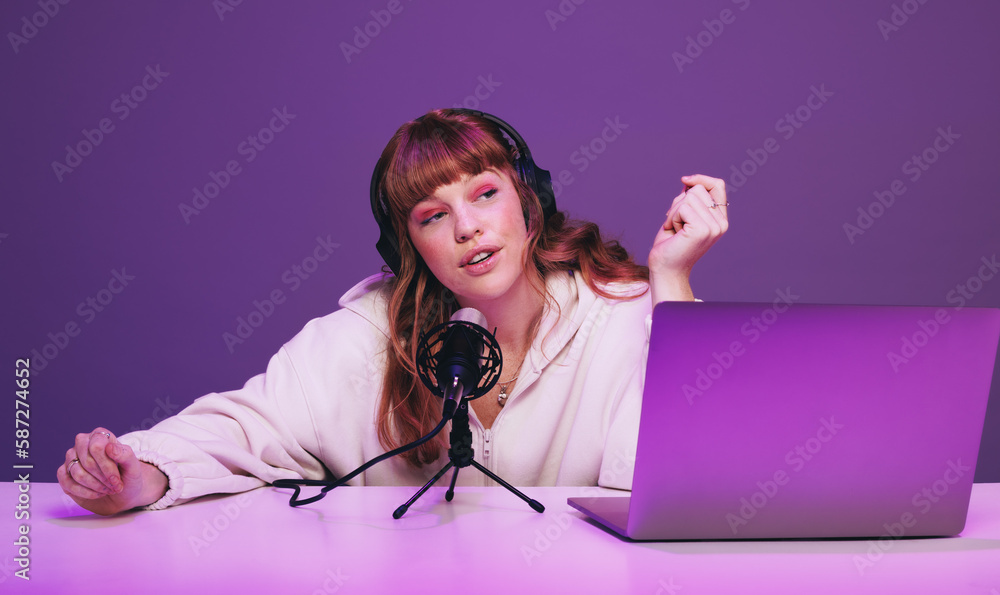 Radio dj speaking into a microphone in a studio