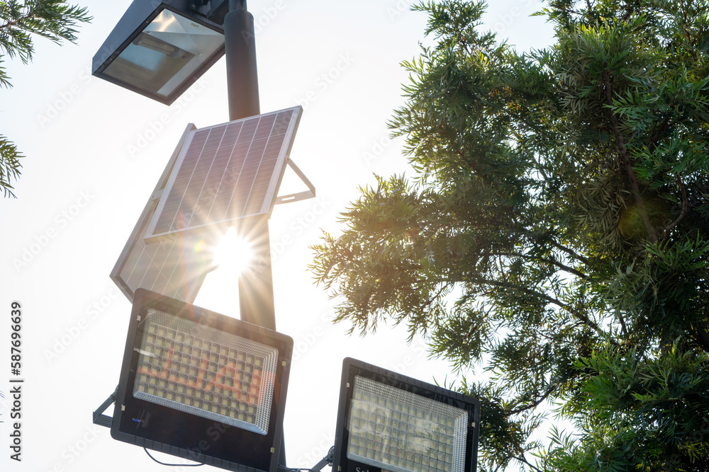 Solar Light. Public city light with solar panel powered on blue sky with clouds. Park public lightin