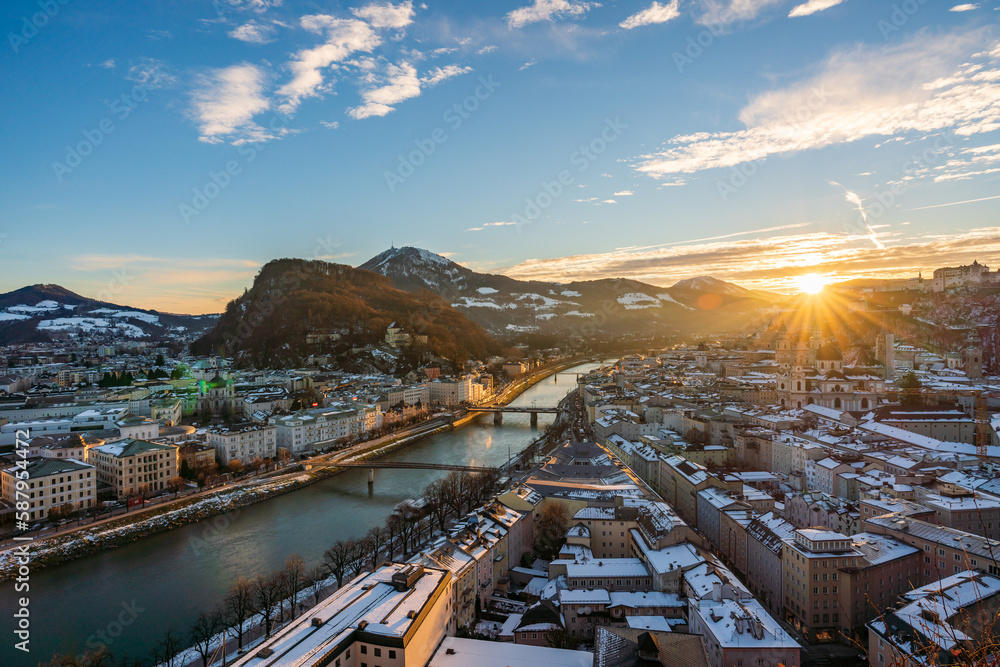 Beautiful sunrise over Fortress Hohensalzburg and historic building in winter, Salzburg , Austria