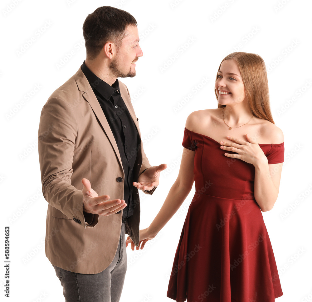 Young man letting his wife go first on white background