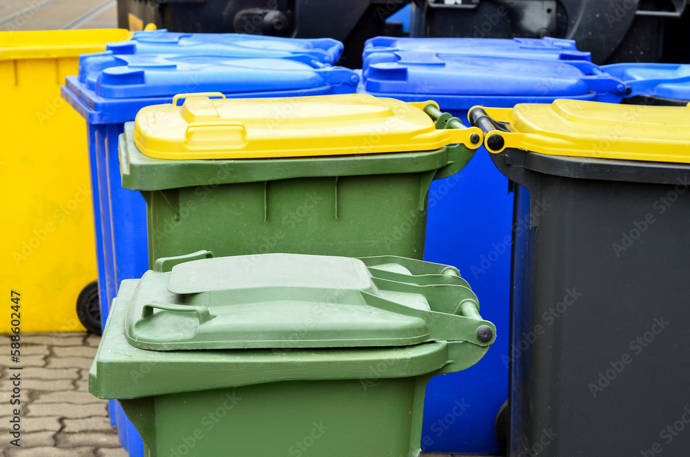 Garbage containers on city street, closeup