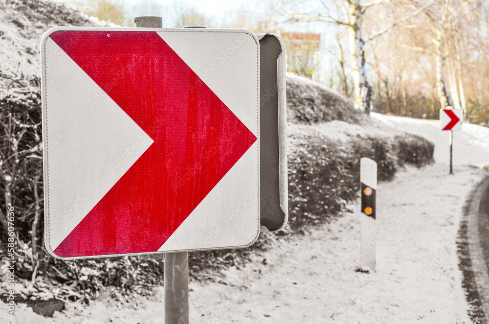 Turn right sign on winter day, closeup