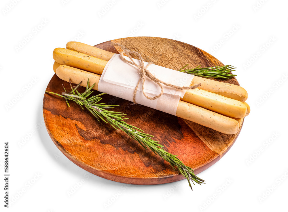 Plate with bunch of tasty Italian Grissini on white background