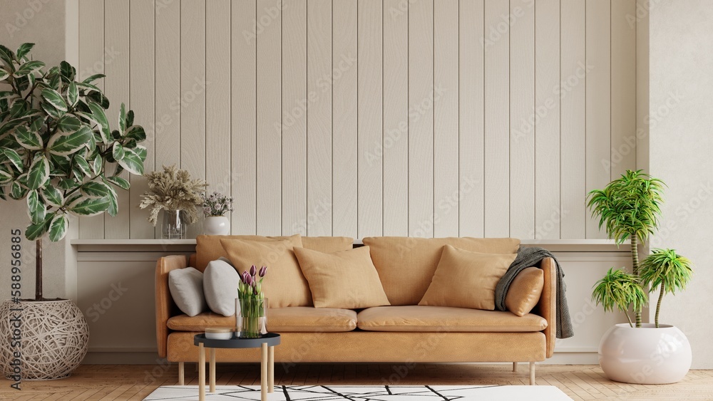 Modern living room with leather sofa and decoration in warm beige background.