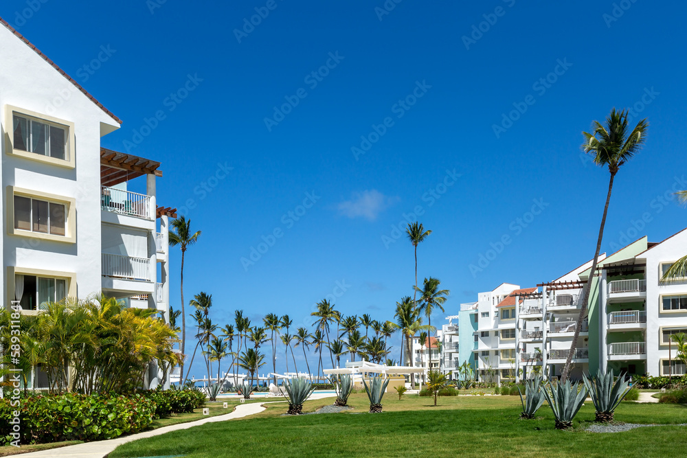 Backyard with tropical garden in typical modern caribbean residence, ocean view, no people