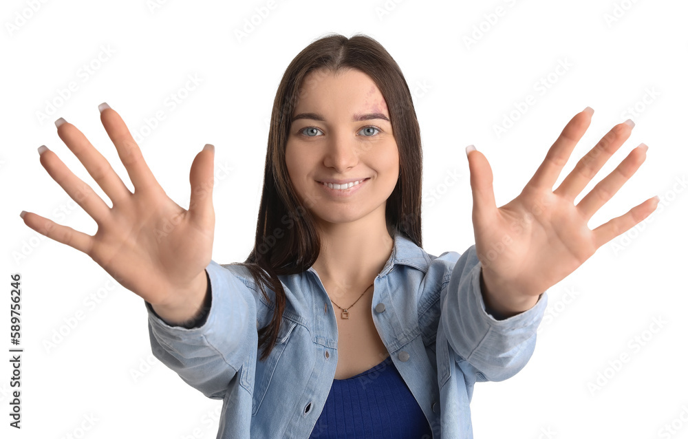 Young woman in shirt showing hands on white background, closeup