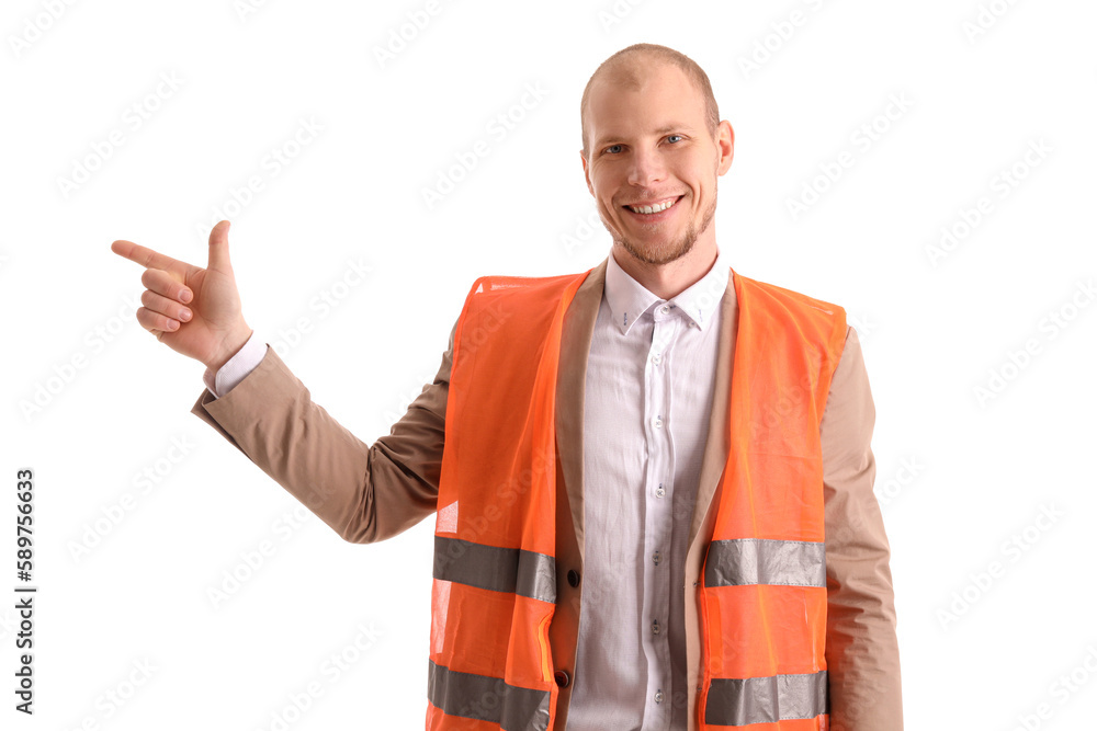 Male worker in vest pointing at something on white background