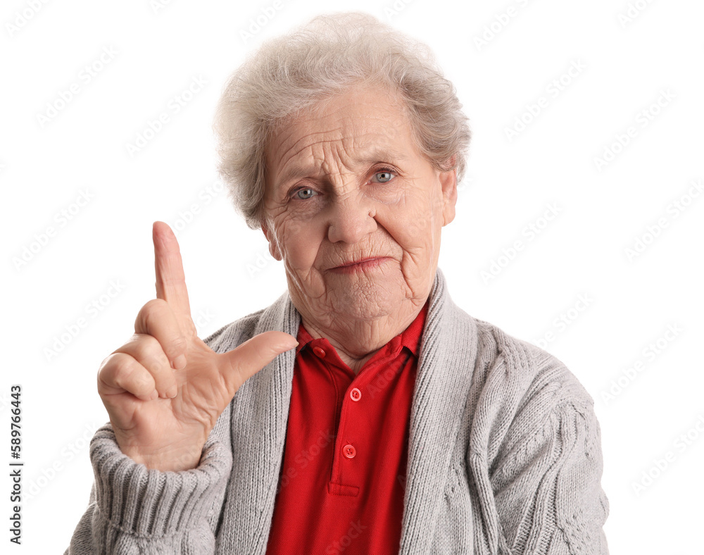 Senior woman showing loser gesture on white background