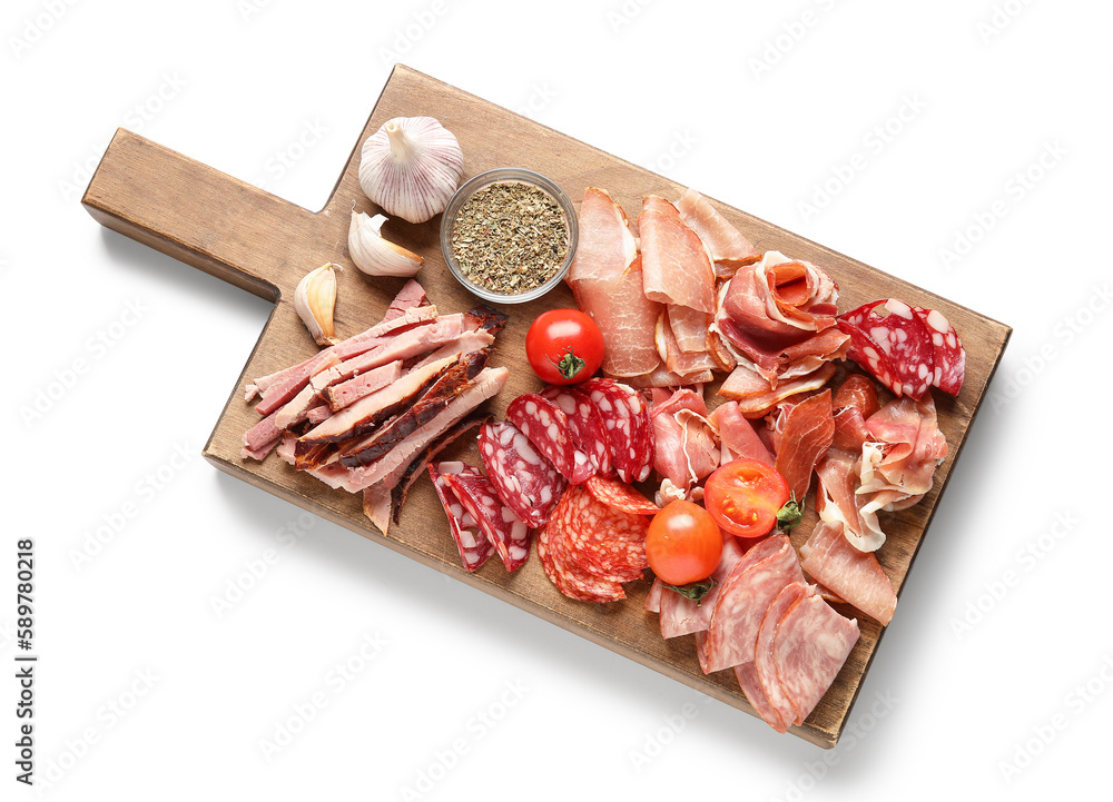 Wooden board with assortment of tasty deli meats isolated on white background