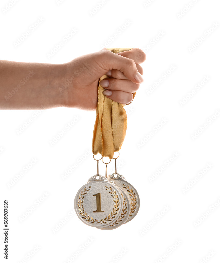 Woman with prize medals on white background