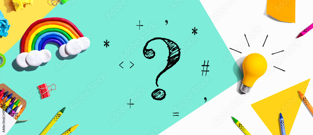 Question mark with school supplies overhead view - flat lay