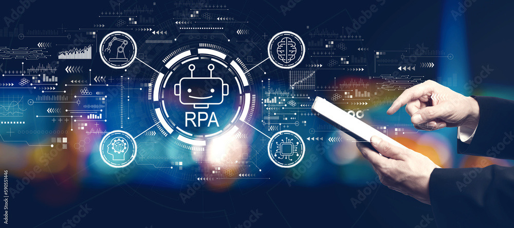 Robotic Process Automation RPA theme with businessman using a tablet computer at night