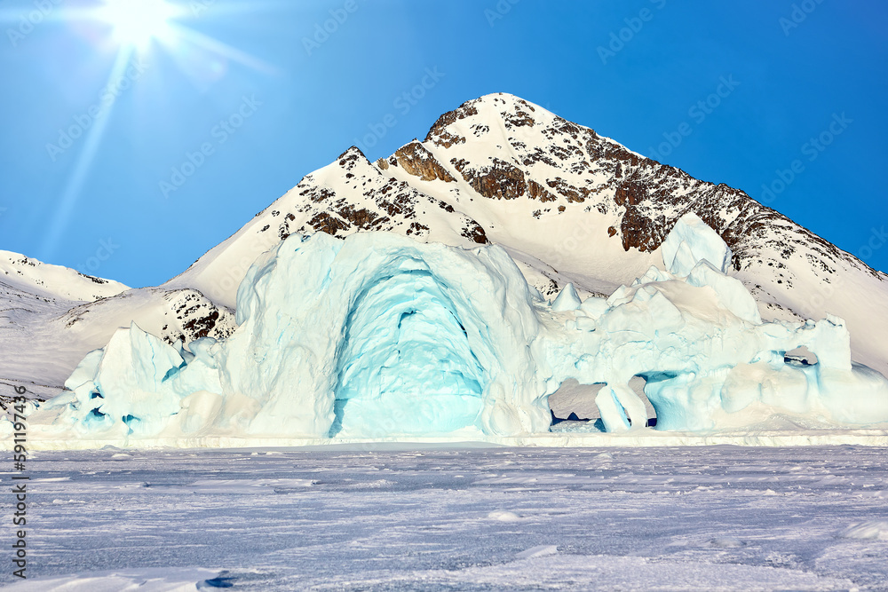 Melting iceberg held down by ices in East Greenland