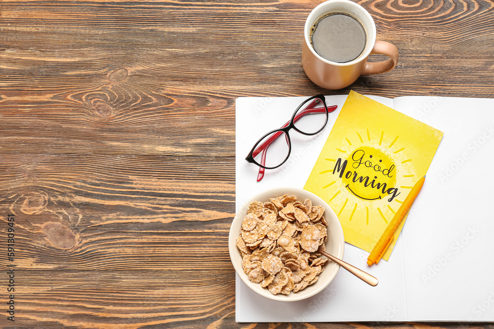 Composition with card, cup of coffee, corn flakes and notebook on wooden background