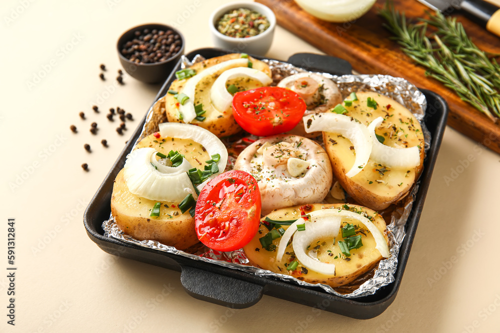 Baking dish with fresh raw vegetables and spices on color background, closeup