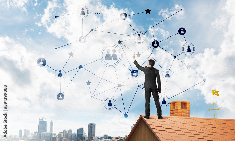 Businessman on house roof presenting networking and connection concept. Mixed media