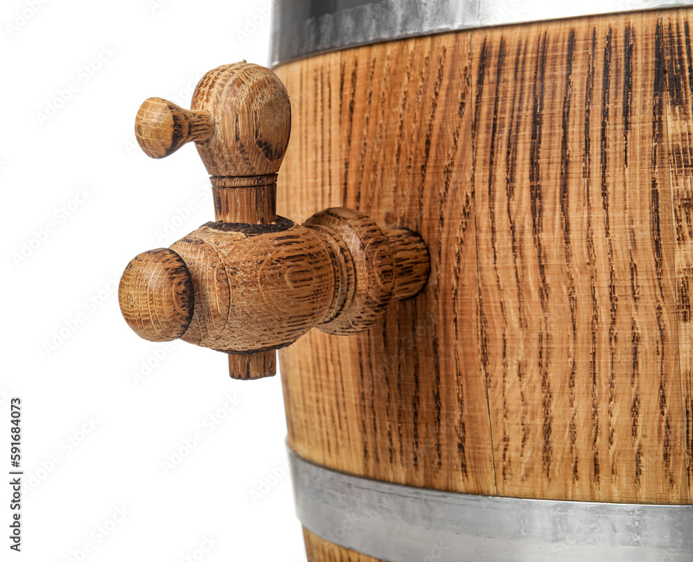 Oak barrel with metal hoops and tap isolated on white background