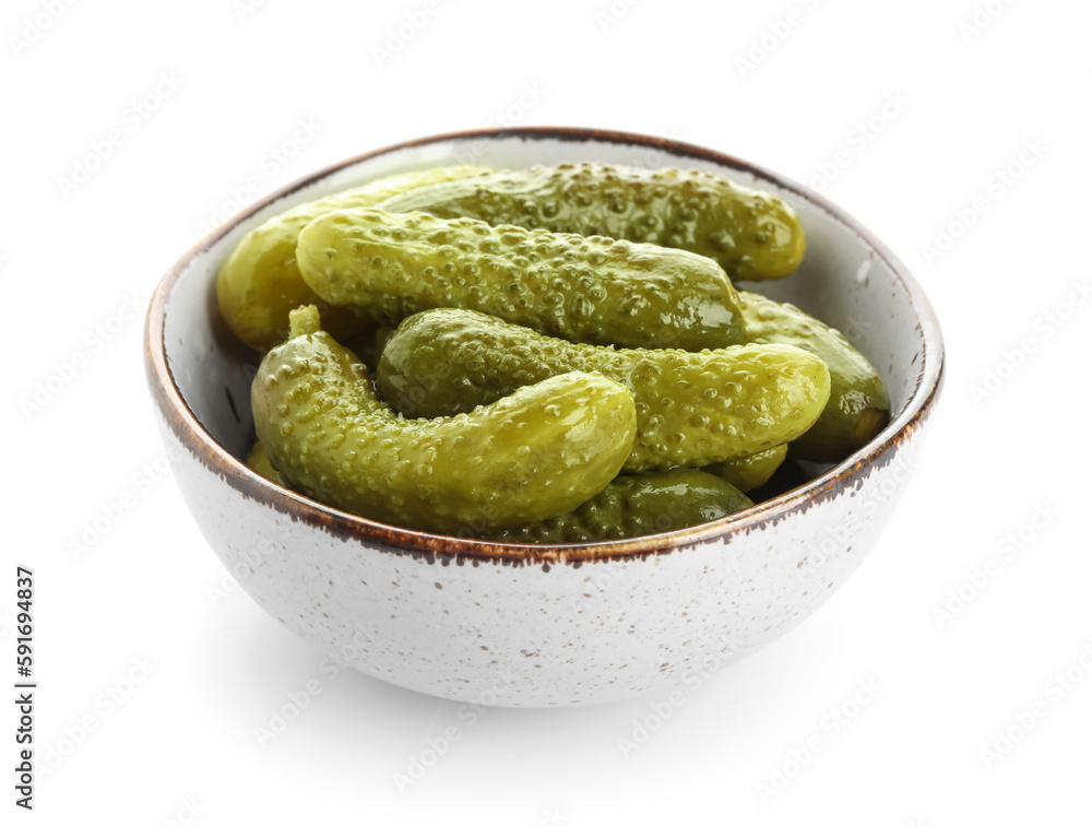 Bowl with tasty fermented cucumbers on white background