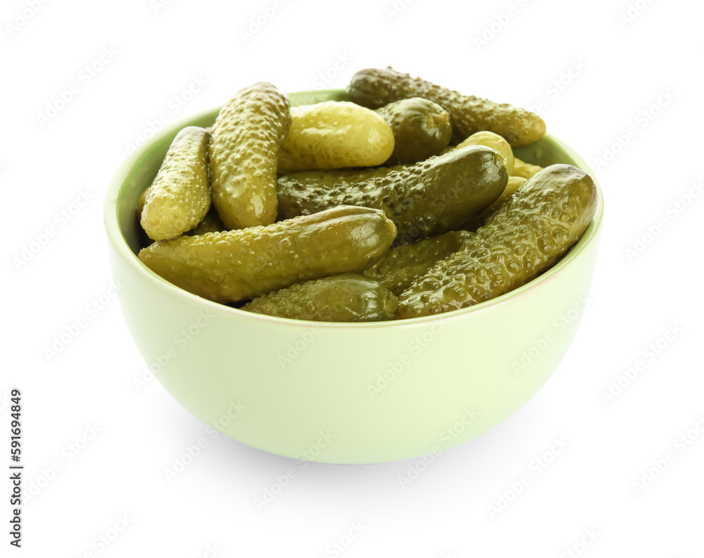 Bowl with tasty fermented cucumbers on white background