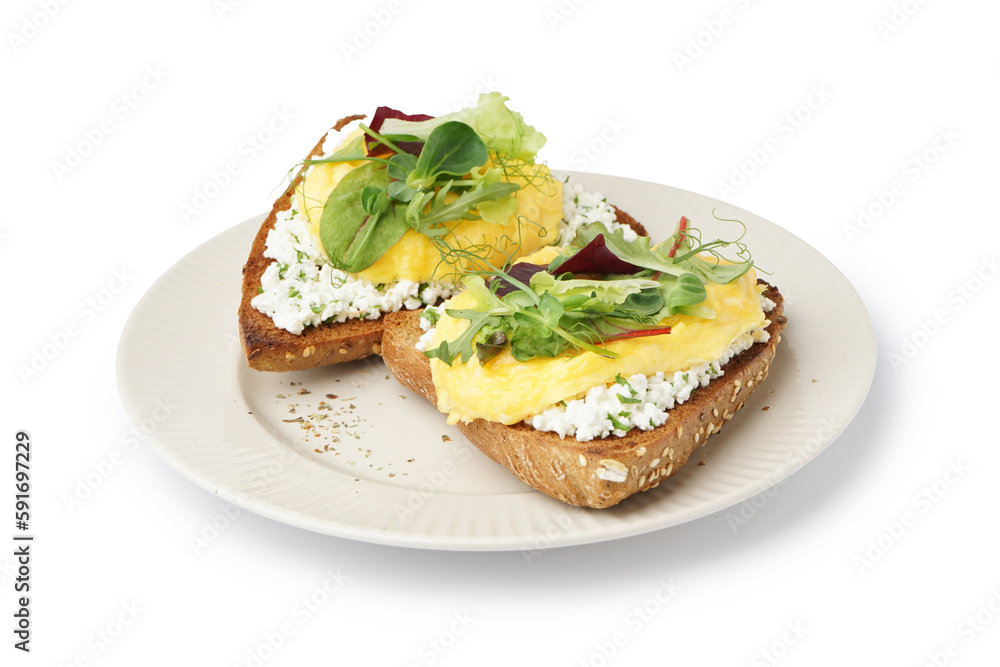 Plate with tasty scrambled eggs sandwiches and greens on white background