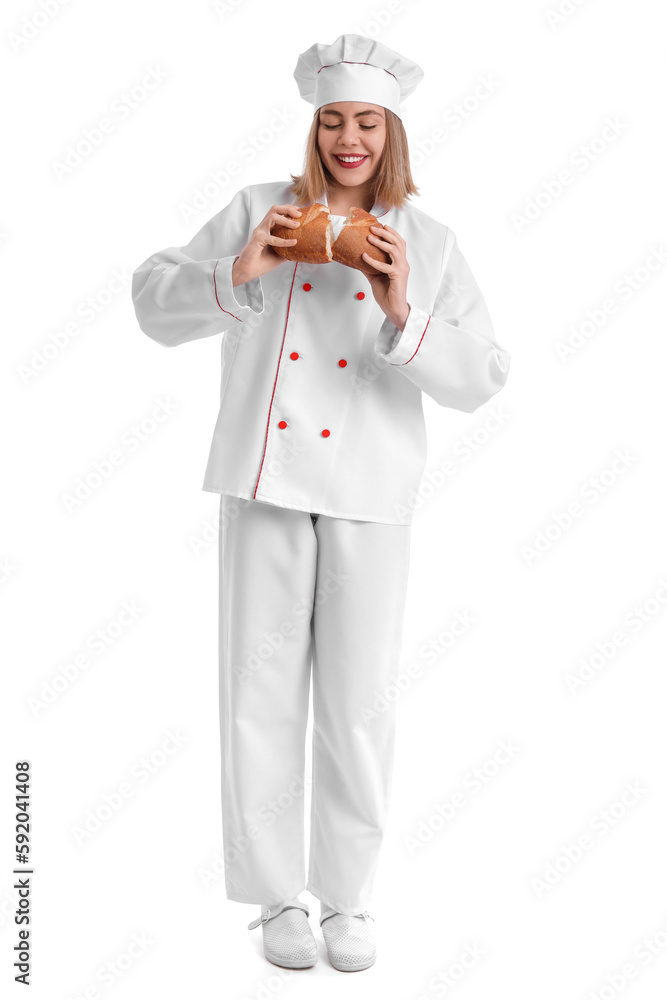 Female baker with fresh bread on white background