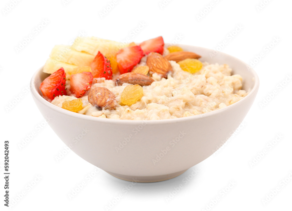 Bowl with tasty oatmeal, raisins, almonds, strawberries and bananas isolated on white background