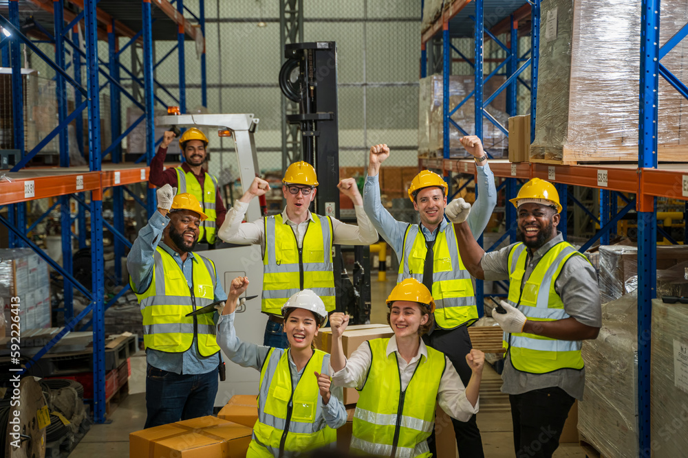 Warehouse workers are meeting together,Group of multicultural logistics employees working as a team 