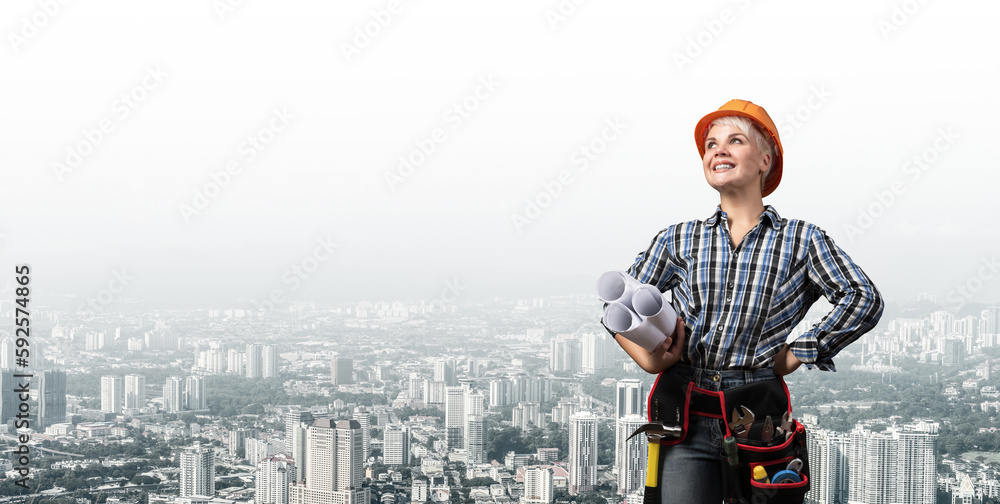 Attractive female engineer in hardhat