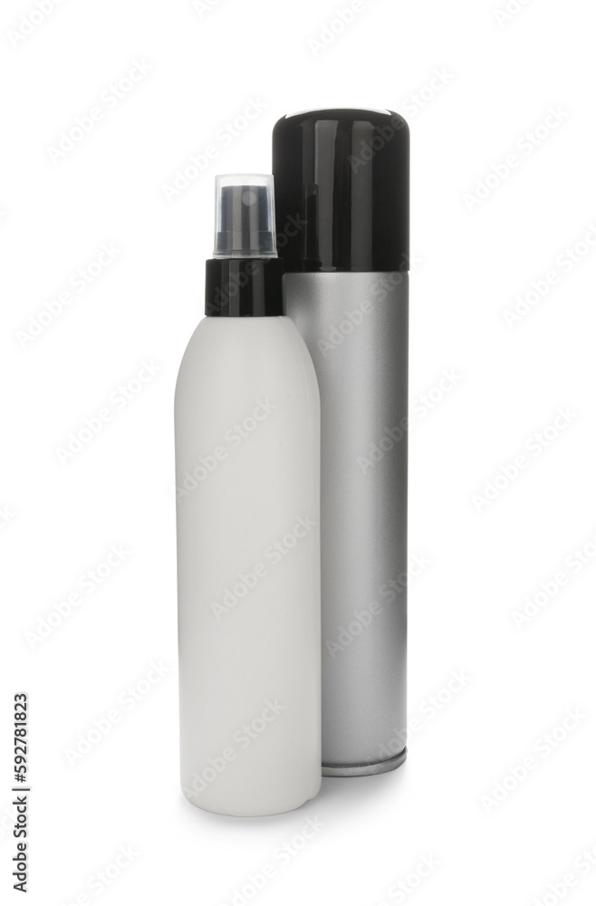 Bottles of hair sprays on white background