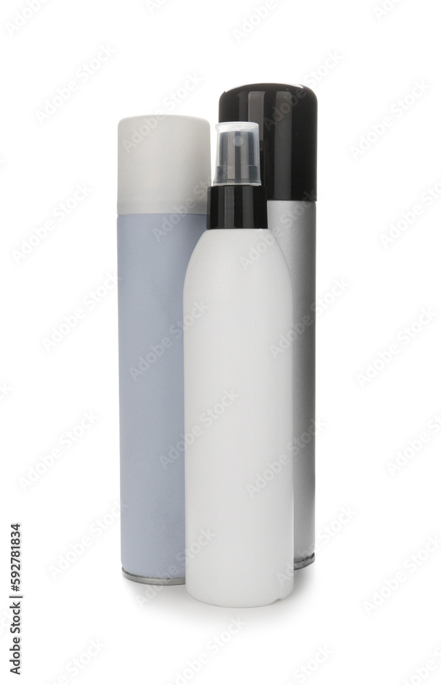 Bottles of hair sprays on white background