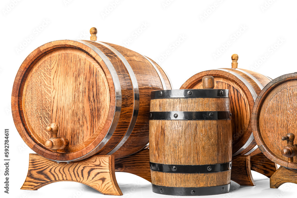 Oak barrels with metal hoops isolated on white background