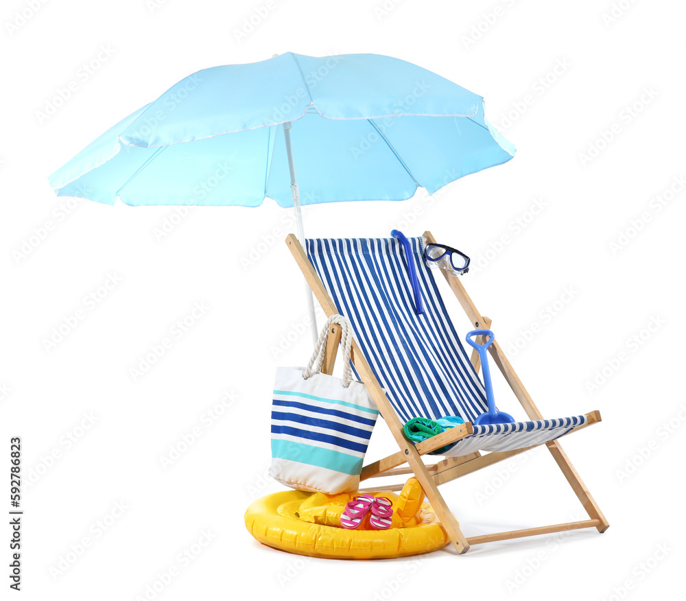 Deck chair, blue umbrella and beach accessories isolated on white background