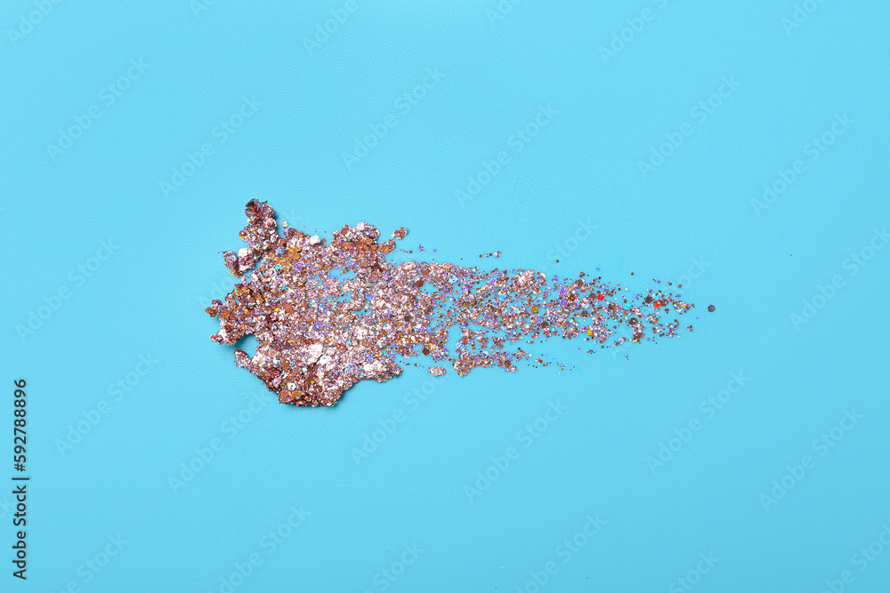 Glitter stroke on blue background