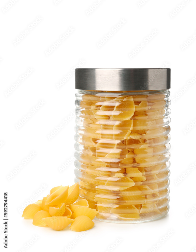 Jar of raw conchiglie pasta isolated on white background