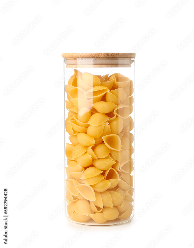 Jar of raw conchiglie pasta isolated on white background